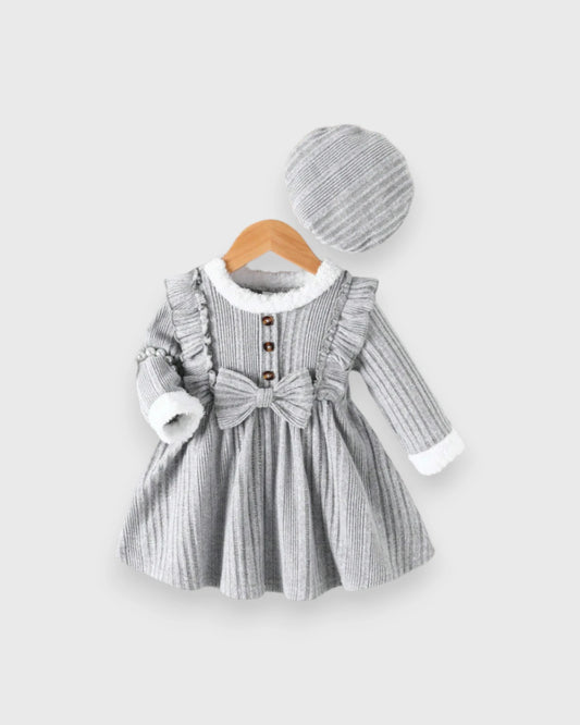 Gray baby girls' ribbed sweater dress with ruffles, white trim and a matching knit beret.